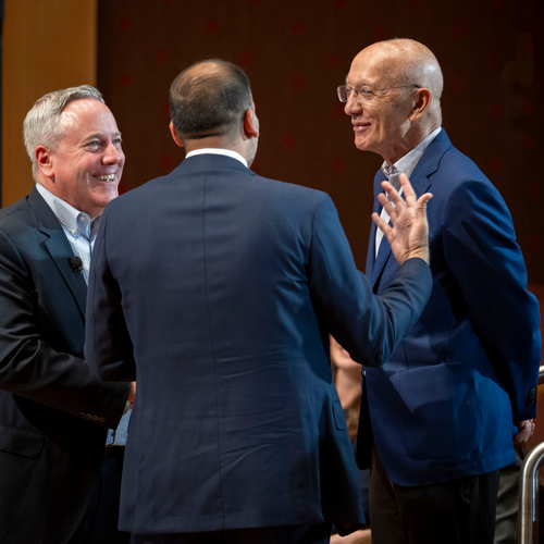 Leaders discuss before the event.